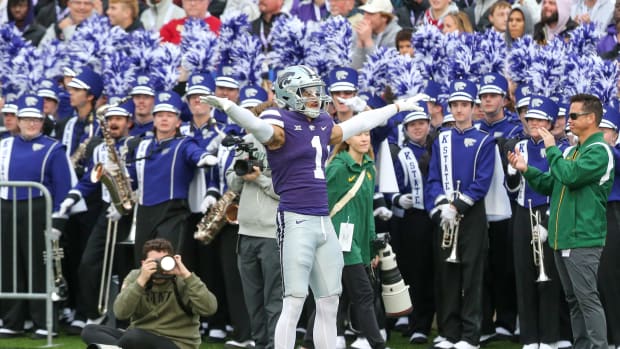 Nov 11, 2023; Manhattan, Kansas, USA; Kansas State Wildcats cornerback Keenan Garber (1) celebrates a fourth down stop during the second quarter against the Baylor Bears at Bill Snyder Family Football Stadium. 